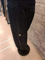 Pantalone con tasche