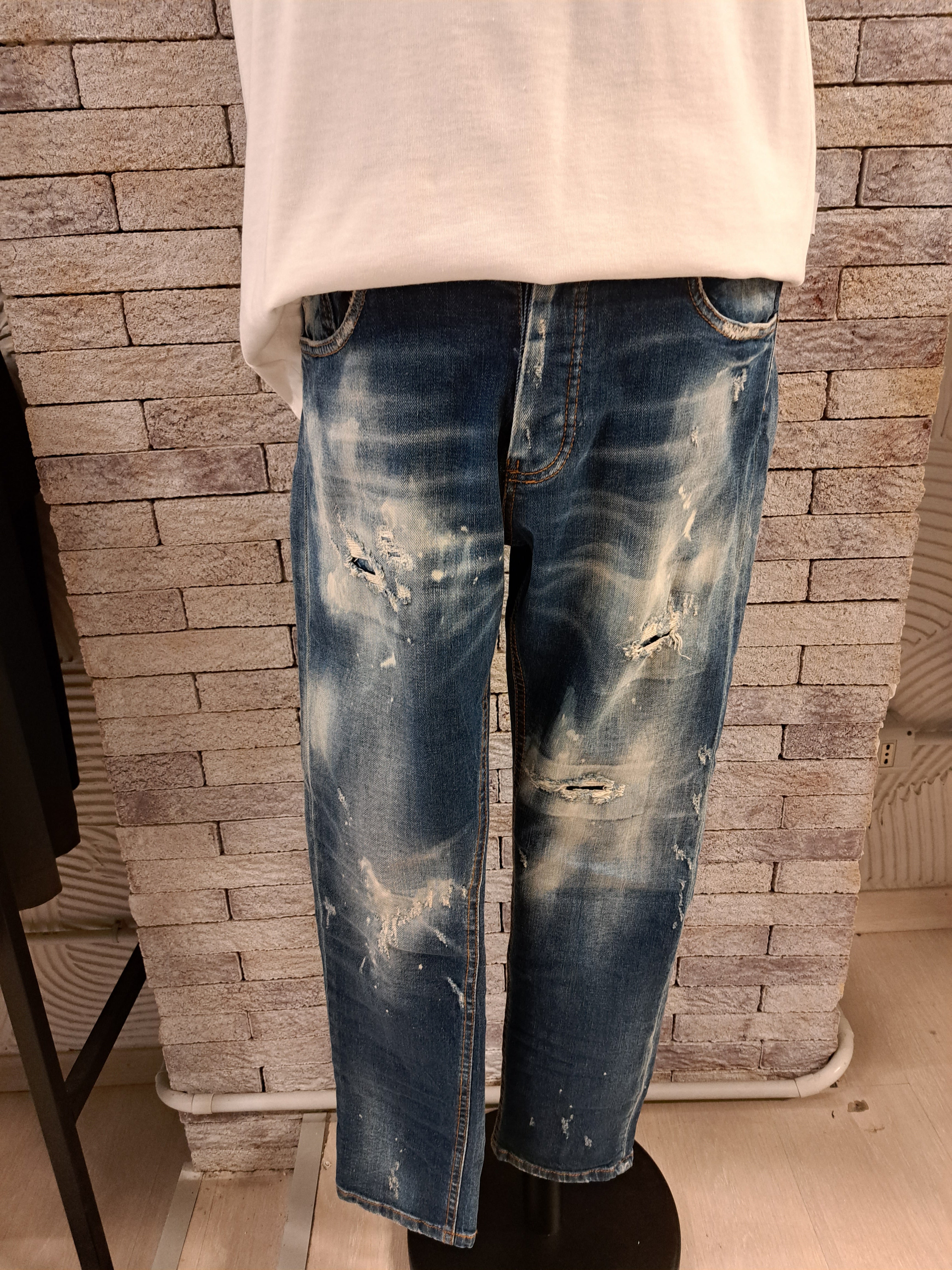 Jeans con rotture